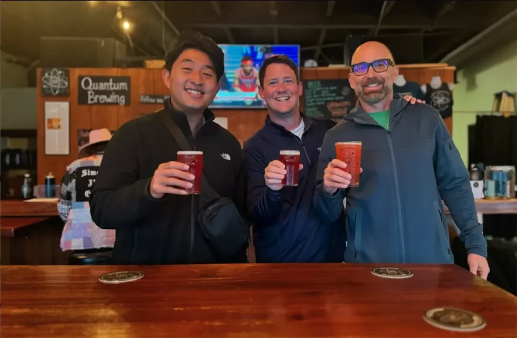 Guys With Beers At Quantum Brewing