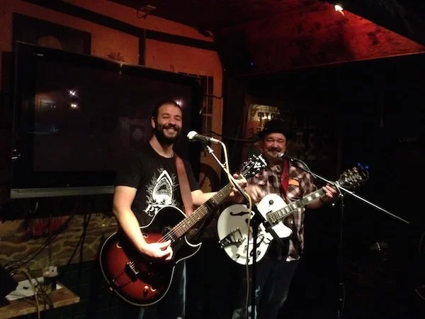 Adam jones and his dad on stage