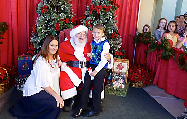 Gabe Bradford
as santa with boy
