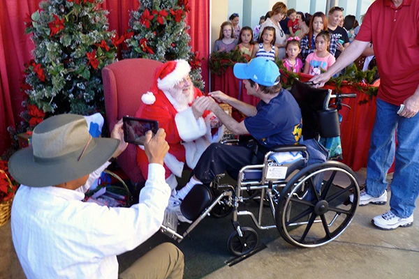 Bill santa boy in wheelchair