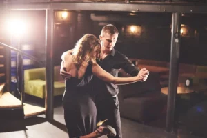 Couple Dancing In Restaurant