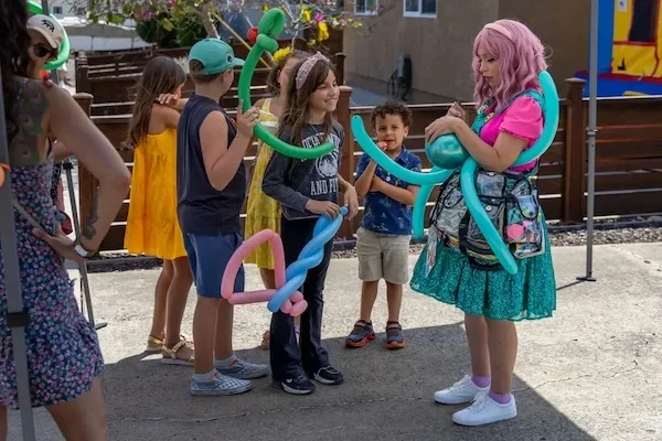 Kids and balloon art maker