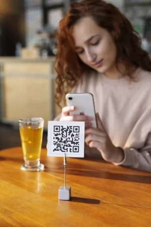 Person scanning qr code