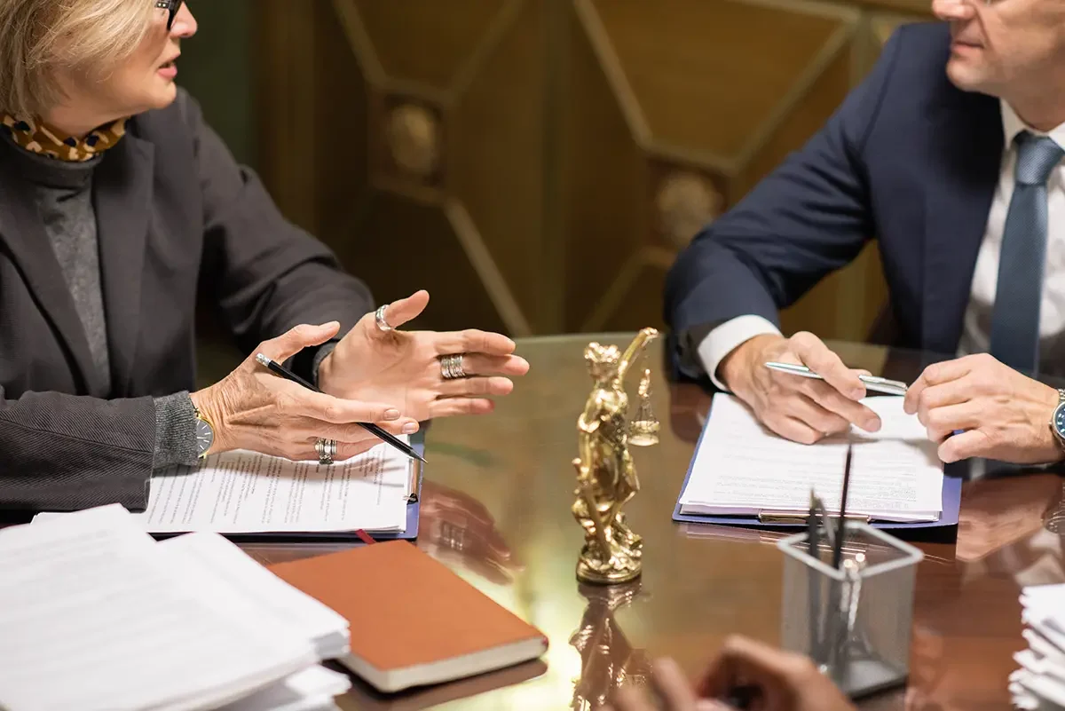 Two Experienced Lawyers Formalwear Interacting By Workplace