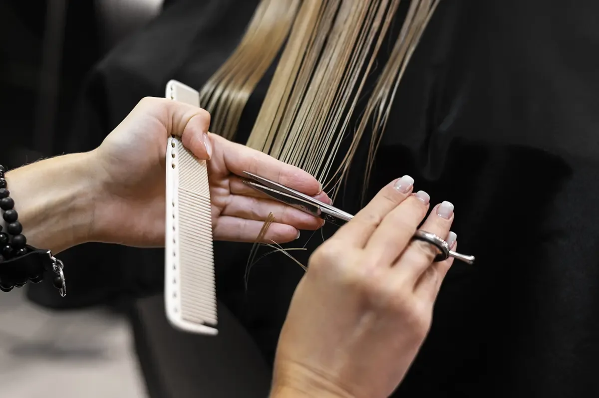 Woman Getting Her Hair Cut Beauty Salon